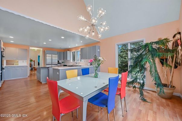 Dining room, Interior, Kitchen, Pendant Lights, Recessed Lighting, Stainless Steel Appliances, Wood Texture Flooring