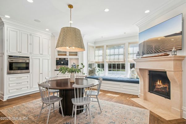 Dining room, Fireplace, Interior, Kitchen, Pendant Lights, Recessed Lighting, Stainless Steel Appliances, Wood Texture Flooring
