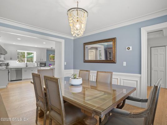 Chandelier, Dining room, Interior, Kitchen, Pendant Lights, Recessed Lighting, Stainless Steel Appliances, Wood Texture Flooring