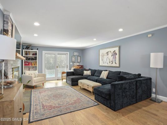 Fireplace, Interior, Living room, Recessed Lighting, Stone Walls, Wood Texture Flooring