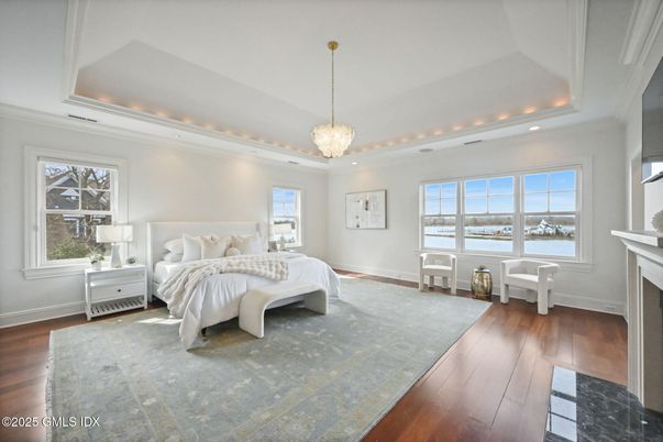 Bedroom, Fireplace, Interior, Pendant Lights, Recessed Lighting, Wood Texture Flooring