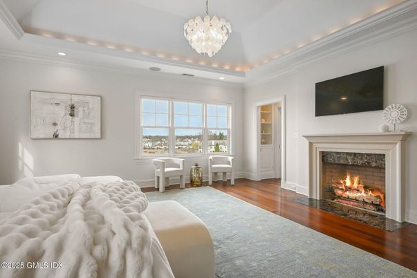 Chandelier, Fireplace, Interior, Recessed Lighting, Wood Texture Flooring