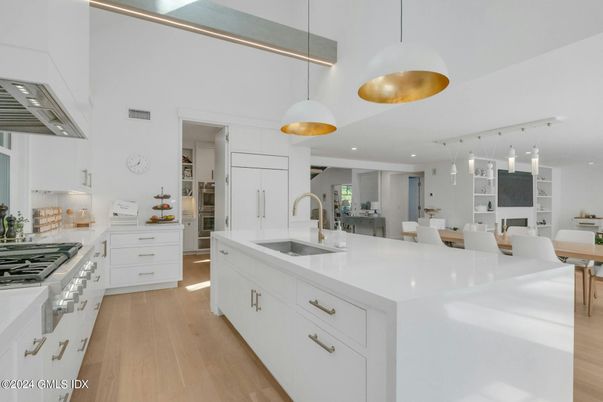Dining room, Interior, Kitchen, Pendant Lights, Recessed Lighting, Stainless Steel Appliances, Wood Texture Flooring