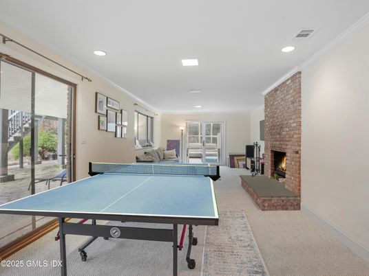 Fireplace, Game Room, Interior, Recessed Lighting, Stone Walls
