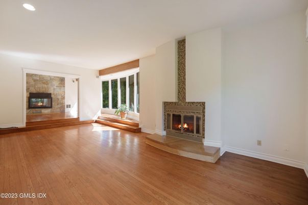 Empty room, Fireplace, Interior, Recessed Lighting, Wood Texture Flooring