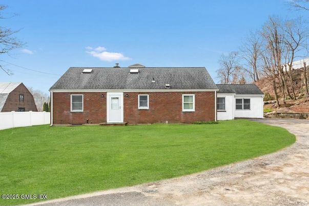 Exterior, Facade, Brick Facade, Cape Cod