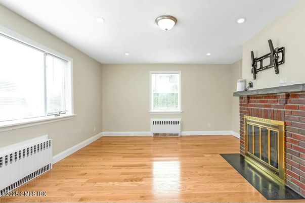Empty room, Fireplace, Interior, Recessed Lighting, Wood Texture Flooring