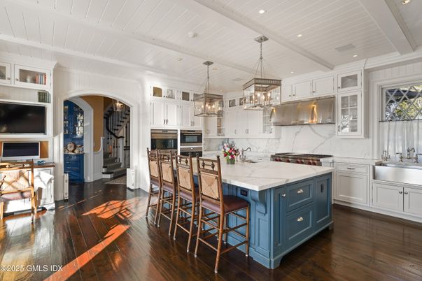 Interior, Kitchen, Marble Walls, Pendant Lights, Recessed Lighting, Stainless Steel Appliances, Wood Texture Flooring