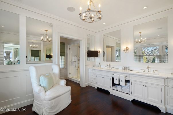 Bathroom, Chandelier, Dual Sink Vanities, Interior, Recessed Lighting, Wood Texture Flooring