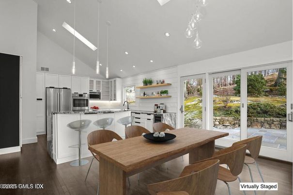 Dining room, Interior, Kitchen, Pendant Lights, Recessed Lighting, Stainless Steel Appliances, Wood Texture Flooring