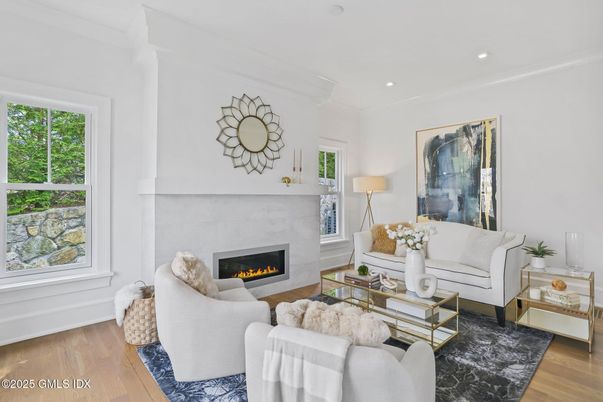 Fireplace, Interior, Living room, Recessed Lighting, Wood Texture Flooring