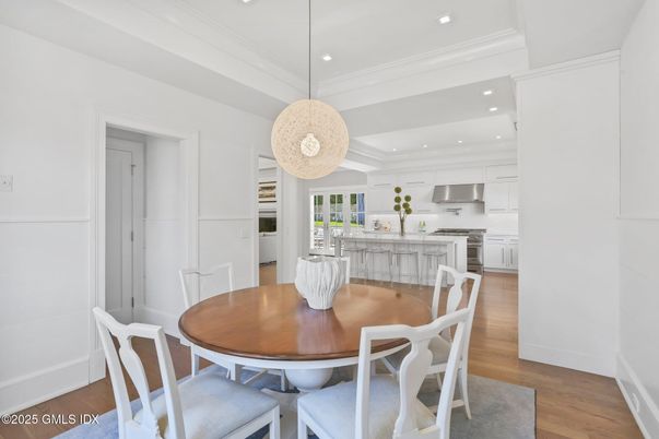 Dining room, Interior, Kitchen, Pendant Lights, Recessed Lighting, Stainless Steel Appliances, Wood Texture Flooring