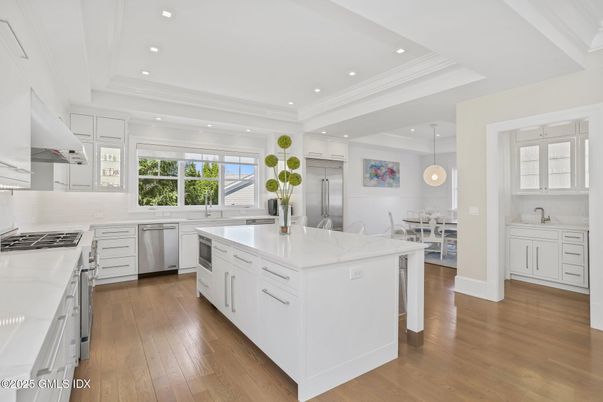 Dining room, Interior, Kitchen, Pendant Lights, Recessed Lighting, Stainless Steel Appliances, Wood Texture Flooring