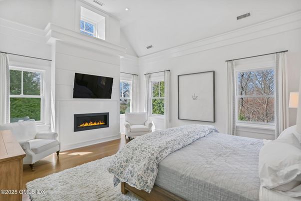 Bedroom, Fireplace, Interior, Recessed Lighting, Wood Texture Flooring