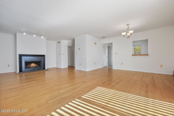 Chandelier, Empty room, Fireplace, Interior, Wood Texture Flooring