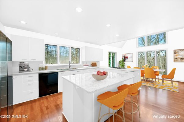 Dining room, Interior, Kitchen, Recessed Lighting, Stainless Steel Appliances, Wood Texture Flooring