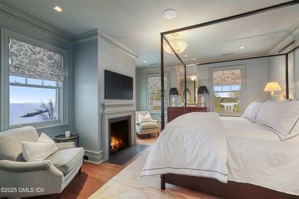 Bedroom, Fireplace, Interior, Recessed Lighting, Water, Wood Texture Flooring