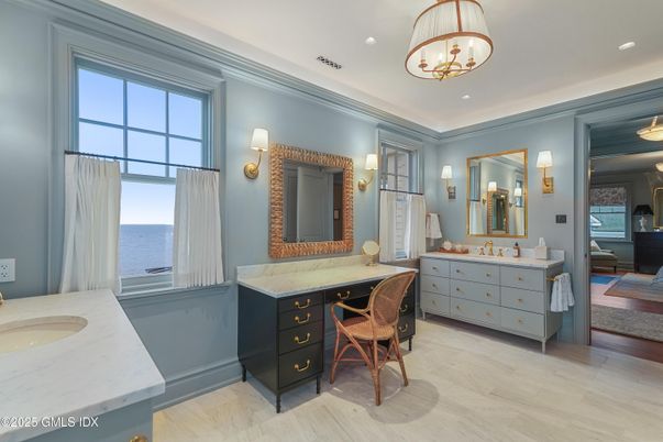 Bathroom, Chandelier, Dual Sink Vanities, Interior, Recessed Lighting, Water, Wood Texture Flooring