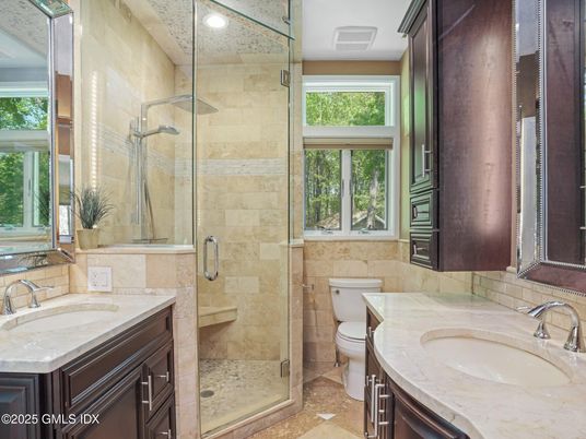 Bathroom, Dual Sink Vanities, Glass Shower, Interior, Recessed Lighting, Stone Walls