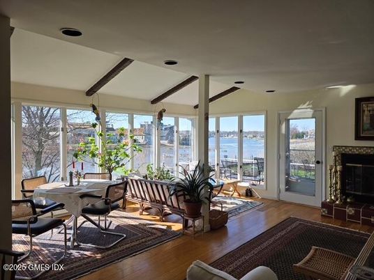 Dining room, Fireplace, Interior, Water, Wooden Beams, Wood Texture Flooring