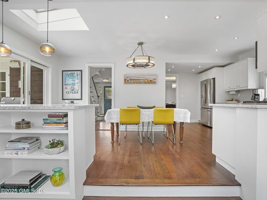 Dining room, Interior, Kitchen, Pendant Lights, Recessed Lighting, Stainless Steel Appliances, Wood Texture Flooring
