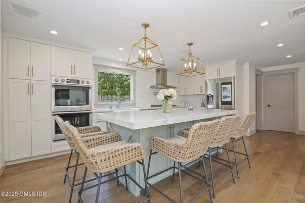 Interior, Kitchen, Pendant Lights, Recessed Lighting, Stainless Steel Appliances, Wood Texture Flooring