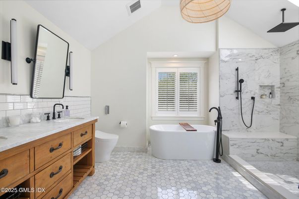Bathroom, Dual Sink Vanities, Free Standing Baths, Interior, Marble Walls, Recessed Lighting