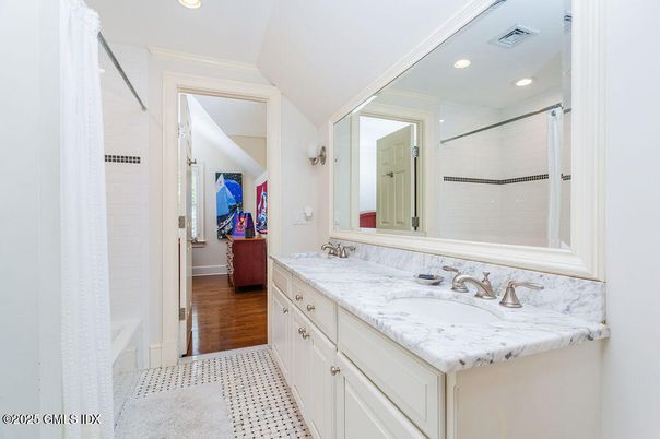 Bathroom, Dual Sink Vanities, Interior, Recessed Lighting, Wood Texture Flooring