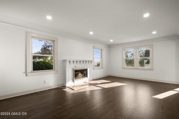 Empty room, Fireplace, Interior, Recessed Lighting, Wood Texture Flooring