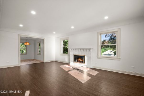 Empty room, Fireplace, Interior, Pendant Lights, Recessed Lighting, Wood Texture Flooring