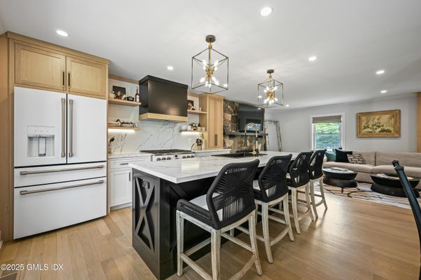 Interior, Kitchen, Marble Walls, Pendant Lights, Recessed Lighting, Wood Texture Flooring
