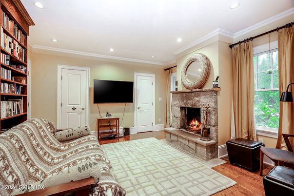 Fireplace, Interior, Living room, Recessed Lighting, Wood Texture Flooring