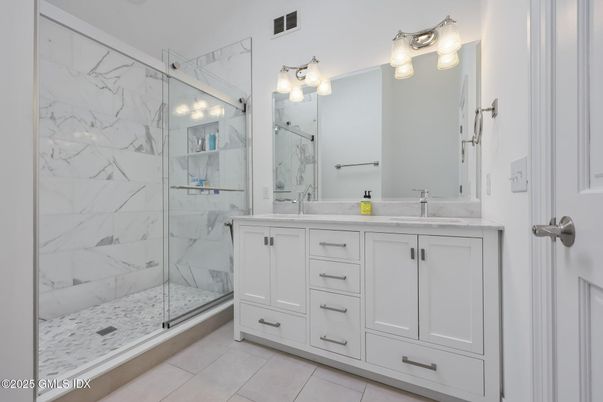 Bathroom, Dual Sink Vanities, Glass Shower, Interior, Marble Walls