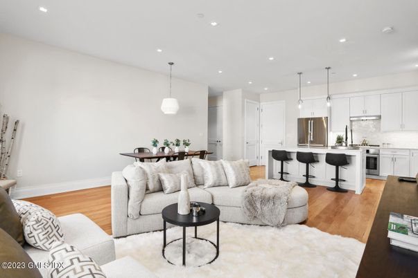 Dining room, Interior, Kitchen, Living room, Pendant Lights, Recessed Lighting, Stainless Steel Appliances, Wood Texture Flooring