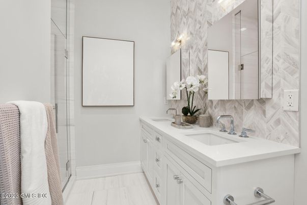 Bathroom, Dual Sink Vanities, Glass Shower, Interior, Wood Texture Flooring