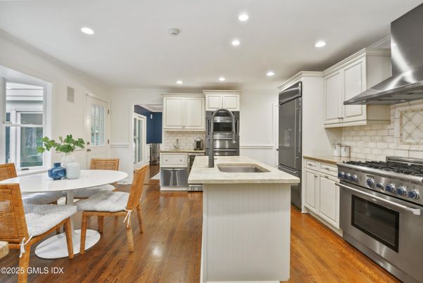 Dining room, Interior, Kitchen, Recessed Lighting, Stainless Steel Appliances, Wood Texture Flooring