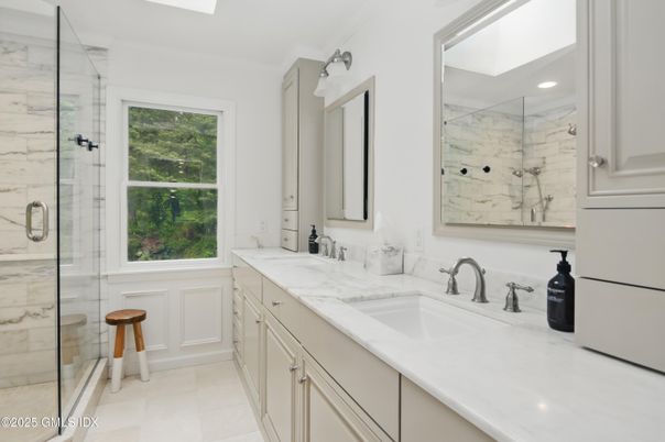 Bathroom, Dual Sink Vanities, Glass Shower, Interior, Marble Walls, Recessed Lighting