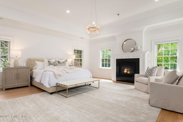 Bedroom, Fireplace, Interior, Pendant Lights, Recessed Lighting, Wood Texture Flooring