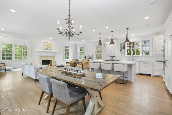 Chandelier, Dining room, Fireplace, Interior, Kitchen, Living room, Pendant Lights, Recessed Lighting, Wood Texture Flooring