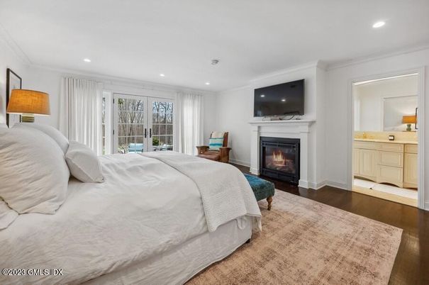 Bedroom, Fireplace, Interior, Recessed Lighting, Wood Texture Flooring