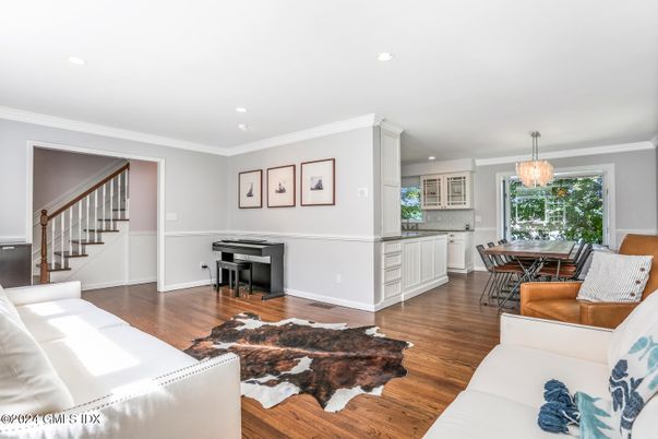 Dining room, Interior, Living room, Pendant Lights, Piano, Recessed Lighting, Wood Texture Flooring