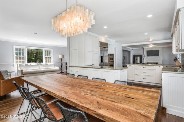 Chandelier, Dining room, Interior, Kitchen, Living room, Recessed Lighting, Stainless Steel Appliances, Wood Texture Flooring