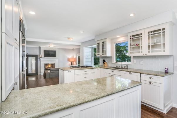 Fireplace, Interior, Kitchen, Recessed Lighting, Wood Texture Flooring