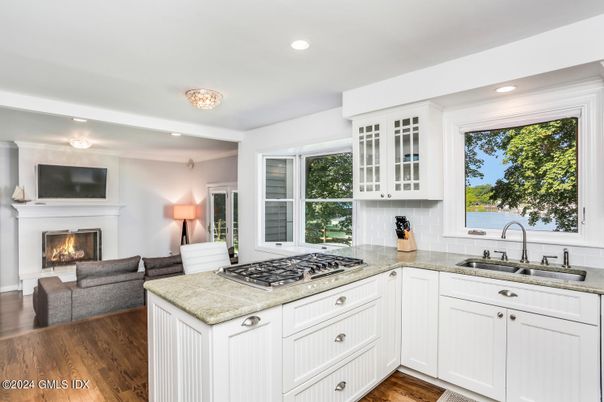 Fireplace, Interior, Kitchen, Living room, Recessed Lighting, Wood Texture Flooring
