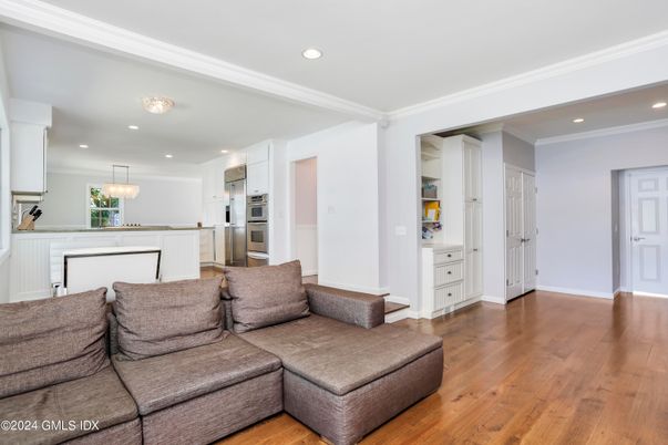 Chandelier, Interior, Kitchen, Living room, Recessed Lighting, Stainless Steel Appliances, Wood Texture Flooring