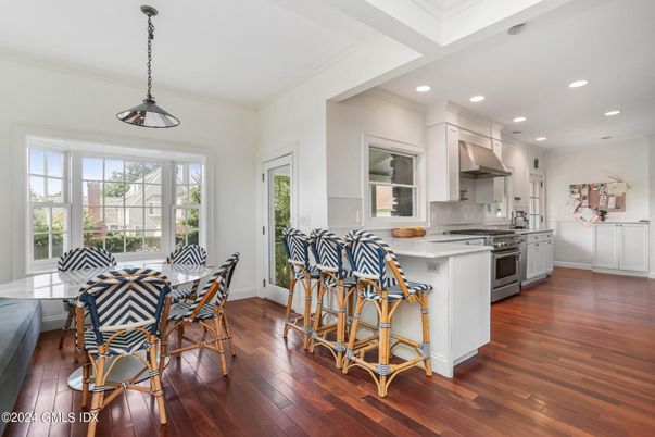 Dining room, Interior, Kitchen, Pendant Lights, Recessed Lighting, Stainless Steel Appliances, Wood Texture Flooring