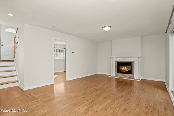 Empty room, Fireplace, Interior, Recessed Lighting, Wood Texture Flooring