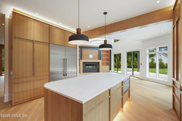 Fireplace, Interior, Kitchen, Pendant Lights, Recessed Lighting, Stainless Steel Appliances, Wood Texture Flooring