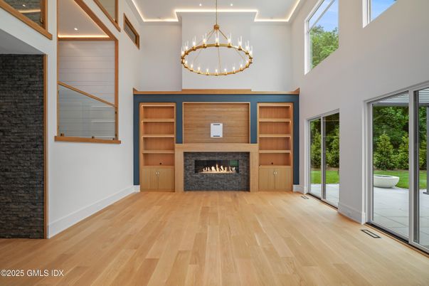 Fireplace, Interior, Pendant Lights, Recessed Lighting, Wood Texture Flooring