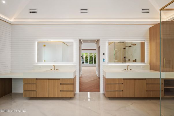 Bathroom, Dual Sink Vanities, Interior, Marble, Recessed Lighting, Wood Texture Flooring